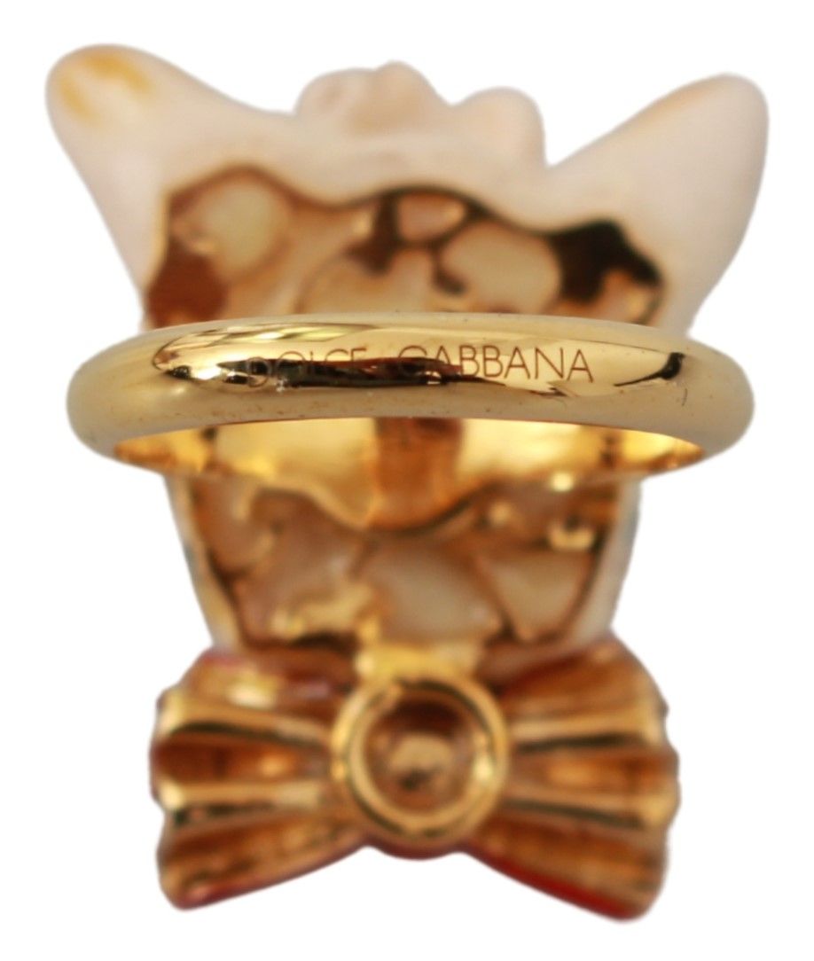 Gold brass resin beige dog pet accessory ring by Dolce & Gabbana featuring a stylish branded design and decorative details.