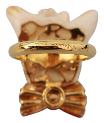 Gold brass resin beige dog pet accessory ring by Dolce & Gabbana featuring a stylish branded design and decorative details.