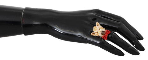 Gold brass resin beige dog pet accessory ring featuring Dolce & Gabbana branding and decorative design.