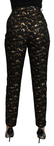 Black gold brocade high waist pants by Dolce & Gabbana, featuring intricate pattern and tailored fit.