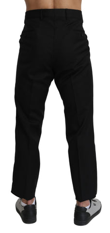 Black cotton wool formal dress pants by Dolce & Gabbana, tailored fit with classic design and belt loops on a white background.