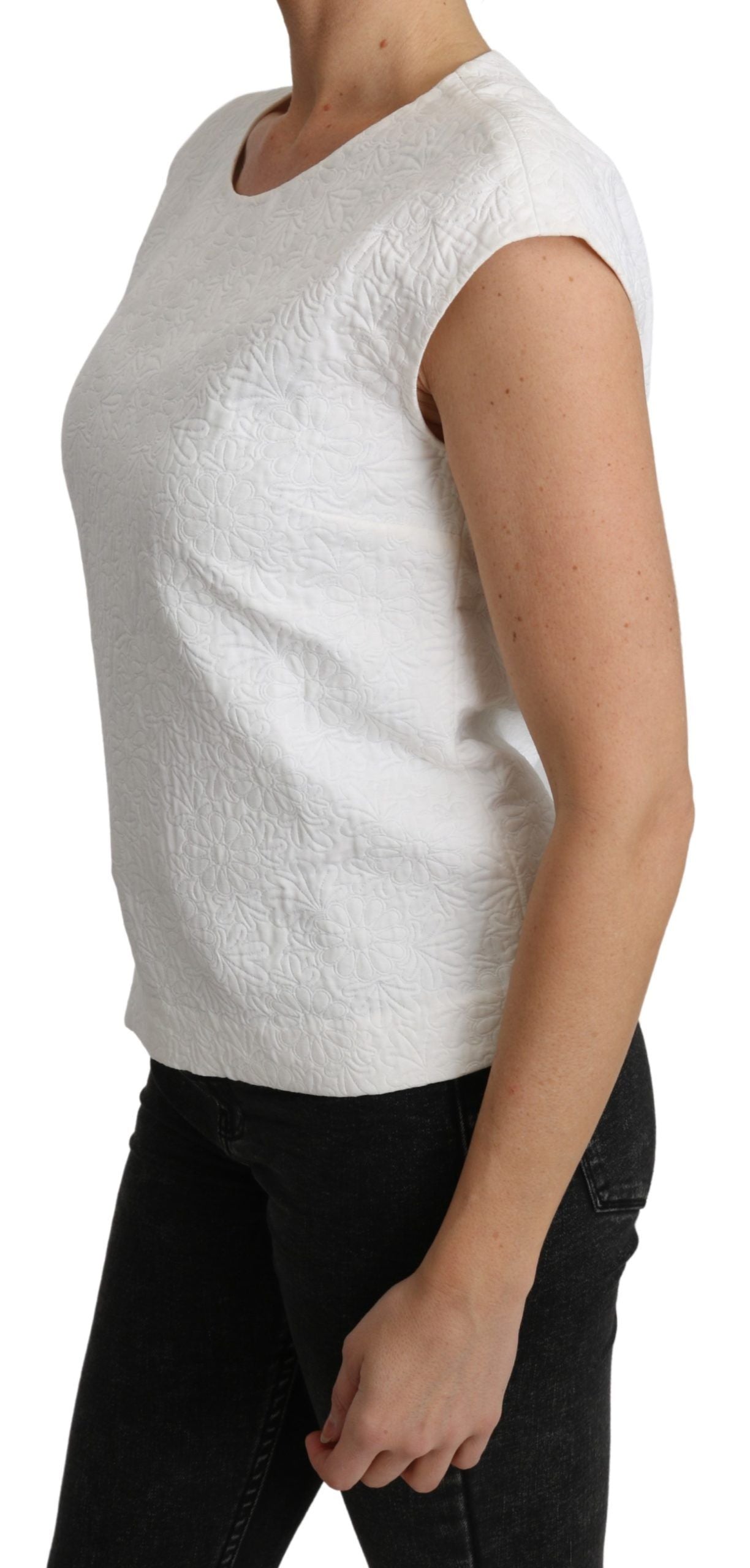 White floral brocade blouse made of cotton by Dolce & Gabbana, featuring intricate floral patterns and a stylish, elegant design.