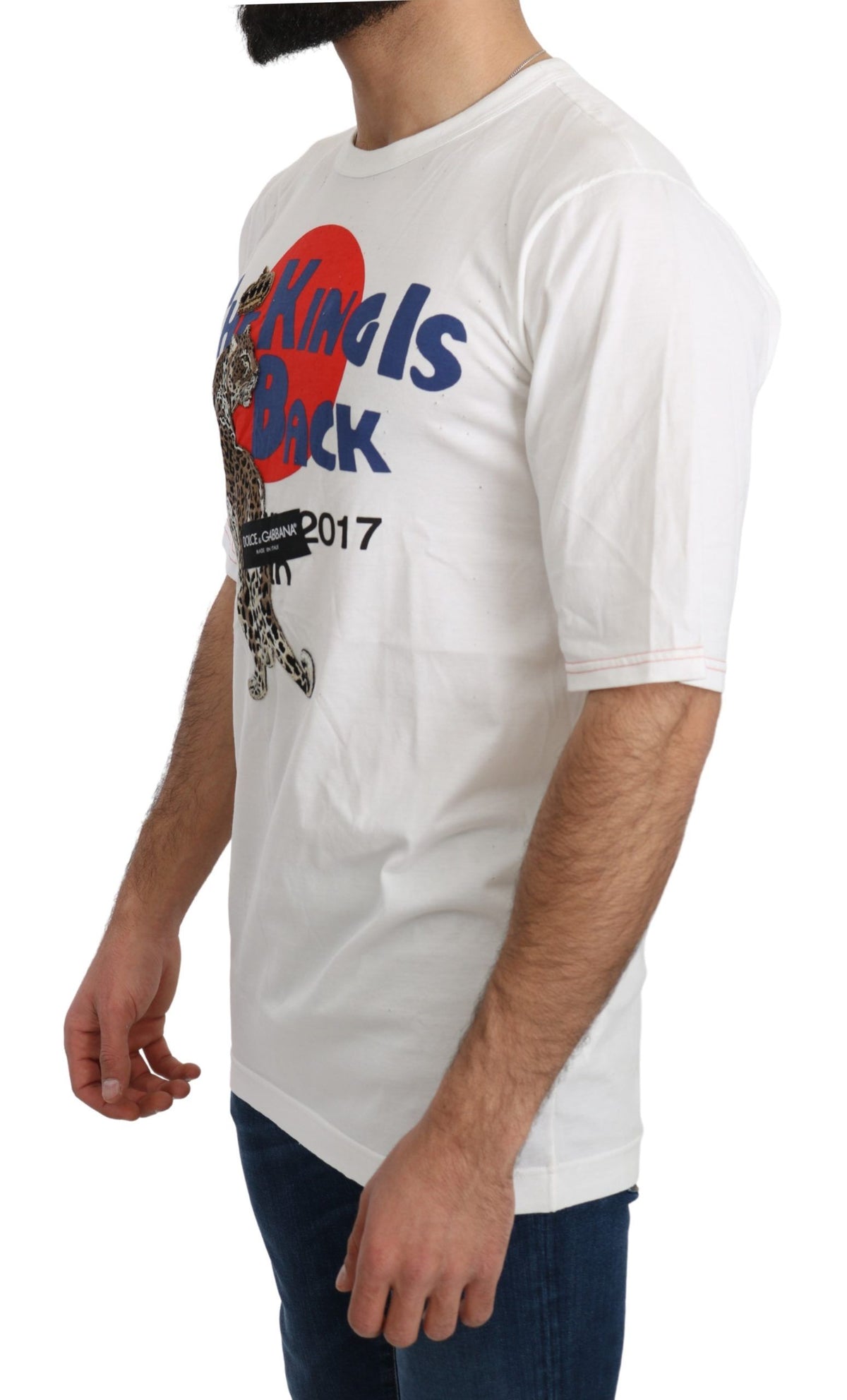 White leopard print Dolce & Gabbana Royal Top T-shirt displayed on a hanger with visible fabric texture and bold pattern.