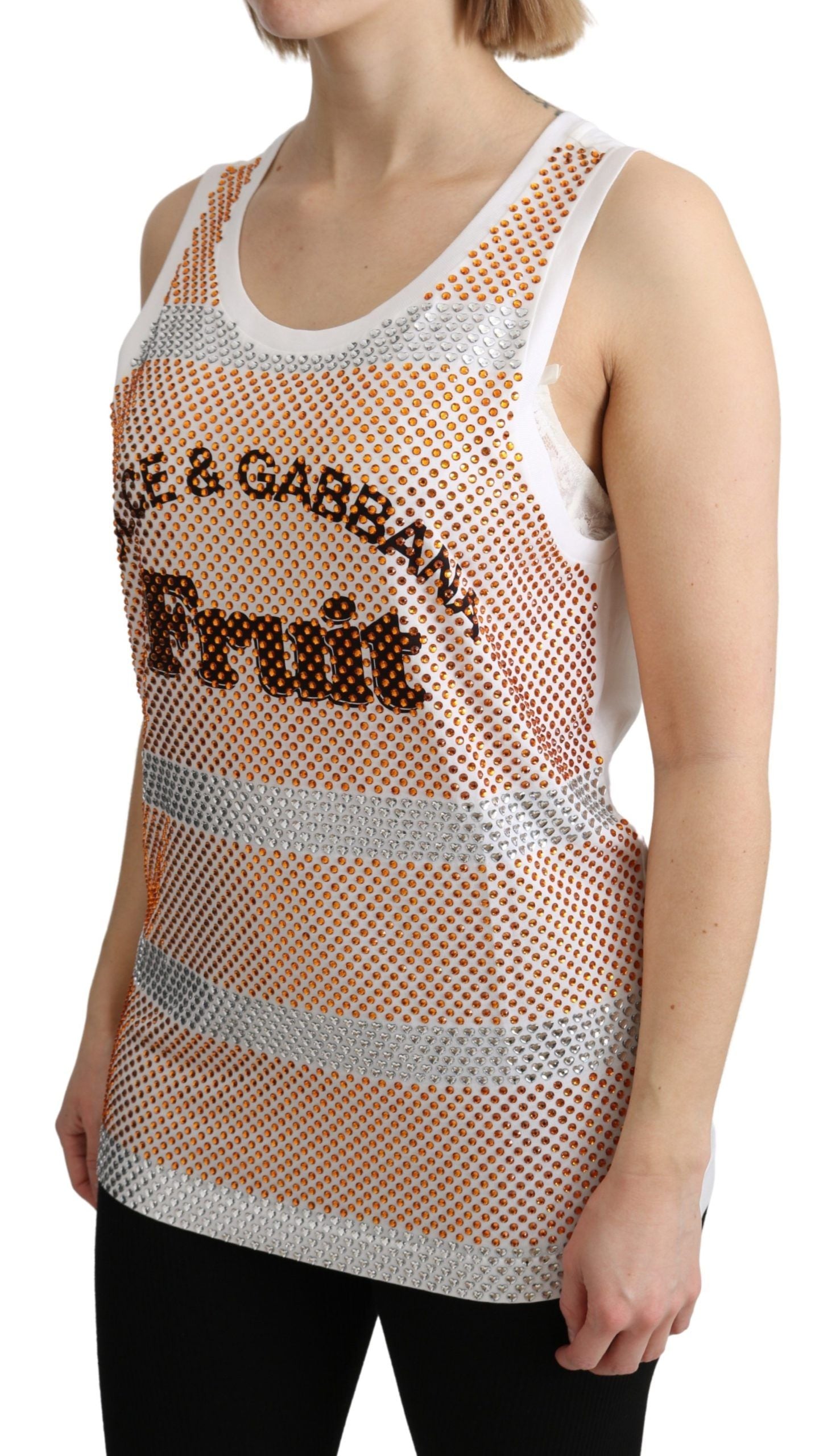 White cotton sleeveless tank top with orange crystal accents by Dolce & Gabbana, styled with a casual, chic look.