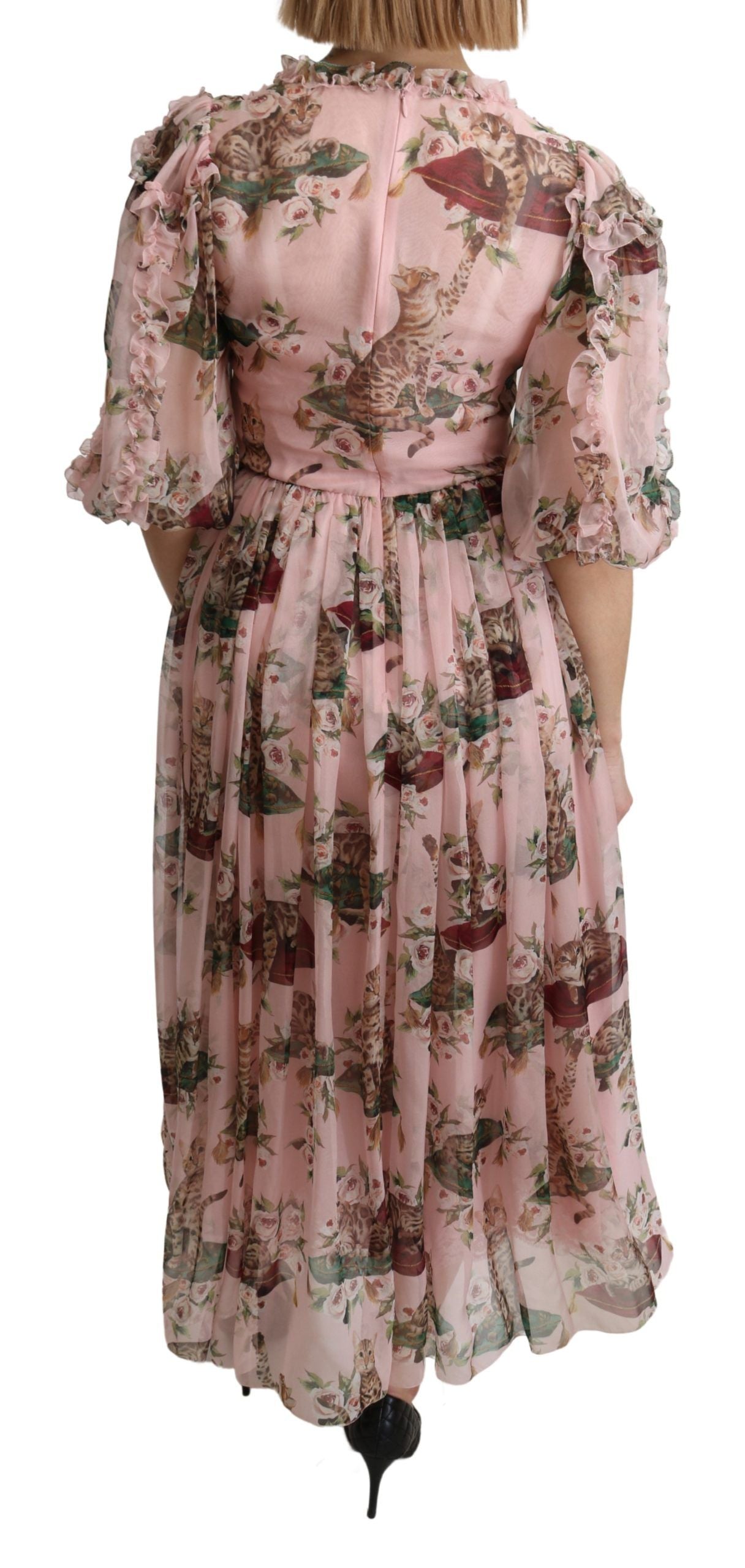 Pink Bengal cat print Dolce & Gabbana silk A-line maxi dress displayed on a hanger.