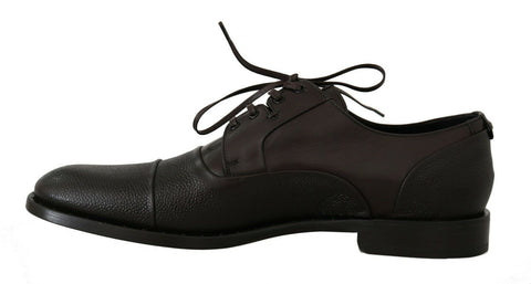 Brown leather lace-up men's dress shoes by Dolce & Gabbana, showcasing polished finish and classic design.
