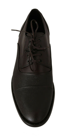 Brown leather lace-up dress shoes for men by Dolce & Gabbana, featuring a sleek design and polished finish.