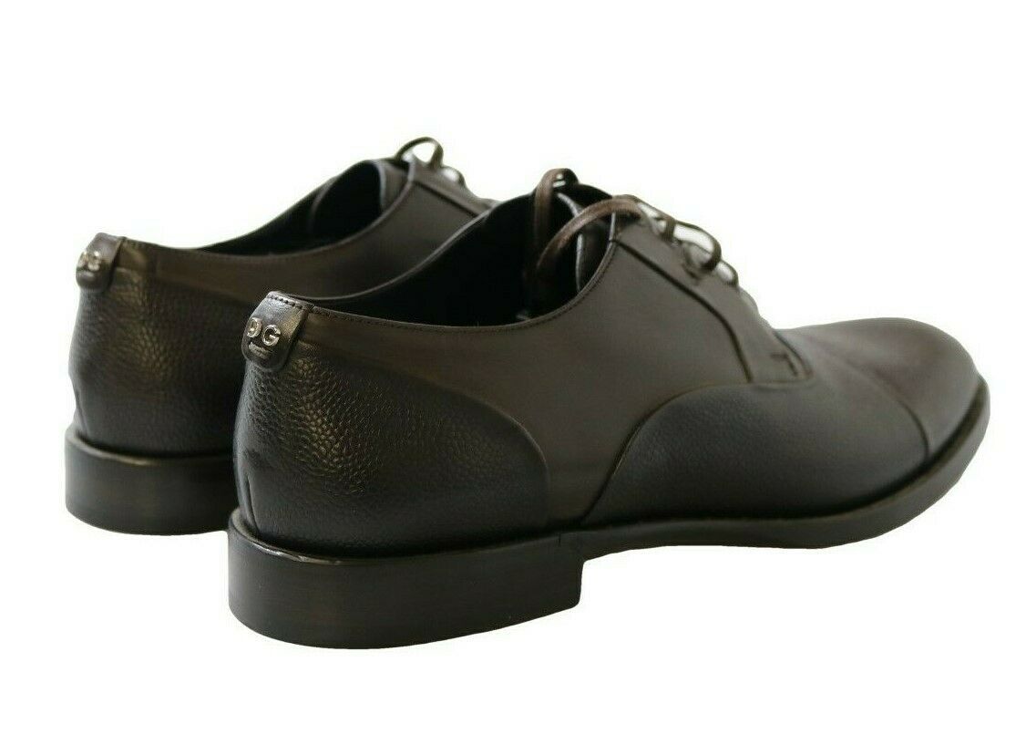 Brown leather lace-up dress shoes for men by Dolce & Gabbana, featuring polished leather and classic design.