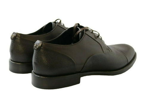Brown leather lace-up dress shoes for men by Dolce & Gabbana, featuring polished leather and classic design.