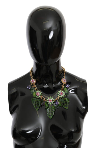 Green leaves and crystal flower pendant necklace with gold brass chain from Dolce & Gabbana, showcasing intricate floral jewelry design.