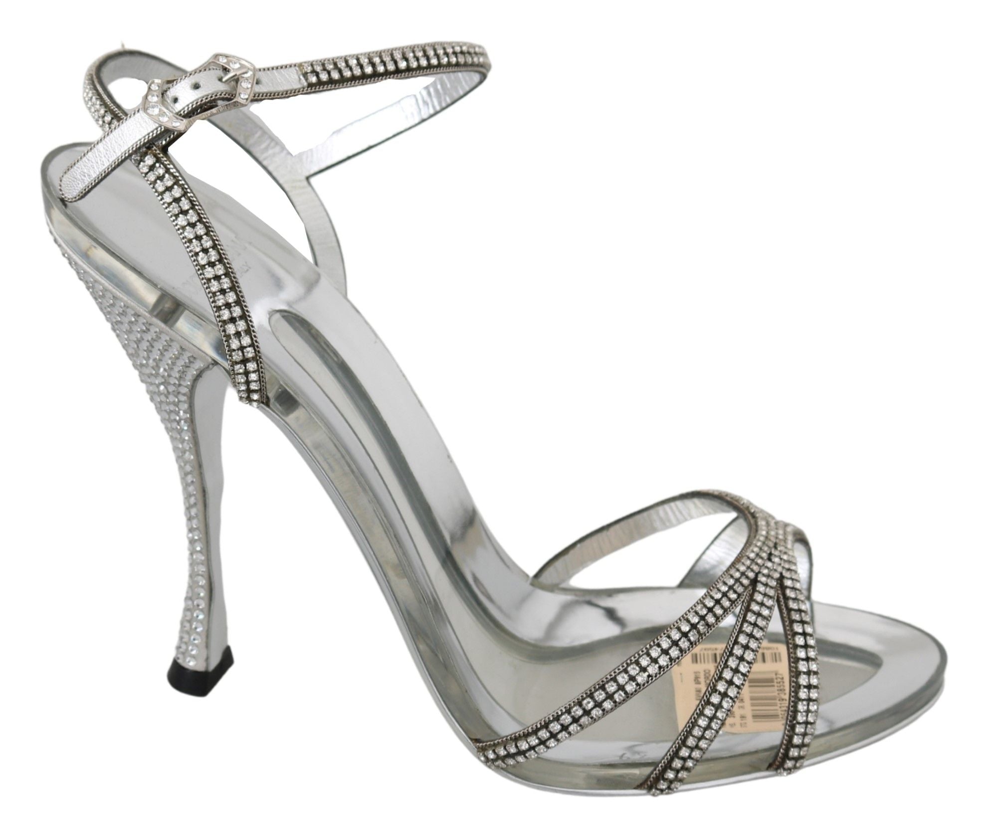 Silver crystal ankle strap sandals from Dolce & Gabbana with elegant open toe design and metallic finish.