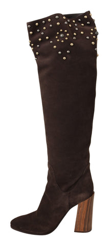 Brown suede knee-high boots with studded details by Dolce & Gabbana, featuring a sleek, stylish design and pointed toe.
