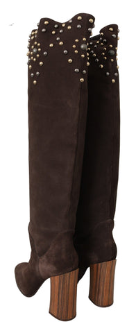Brown suede knee-high boots with studded details by Dolce & Gabbana, featuring a sleek, stylish design and pointed toe.