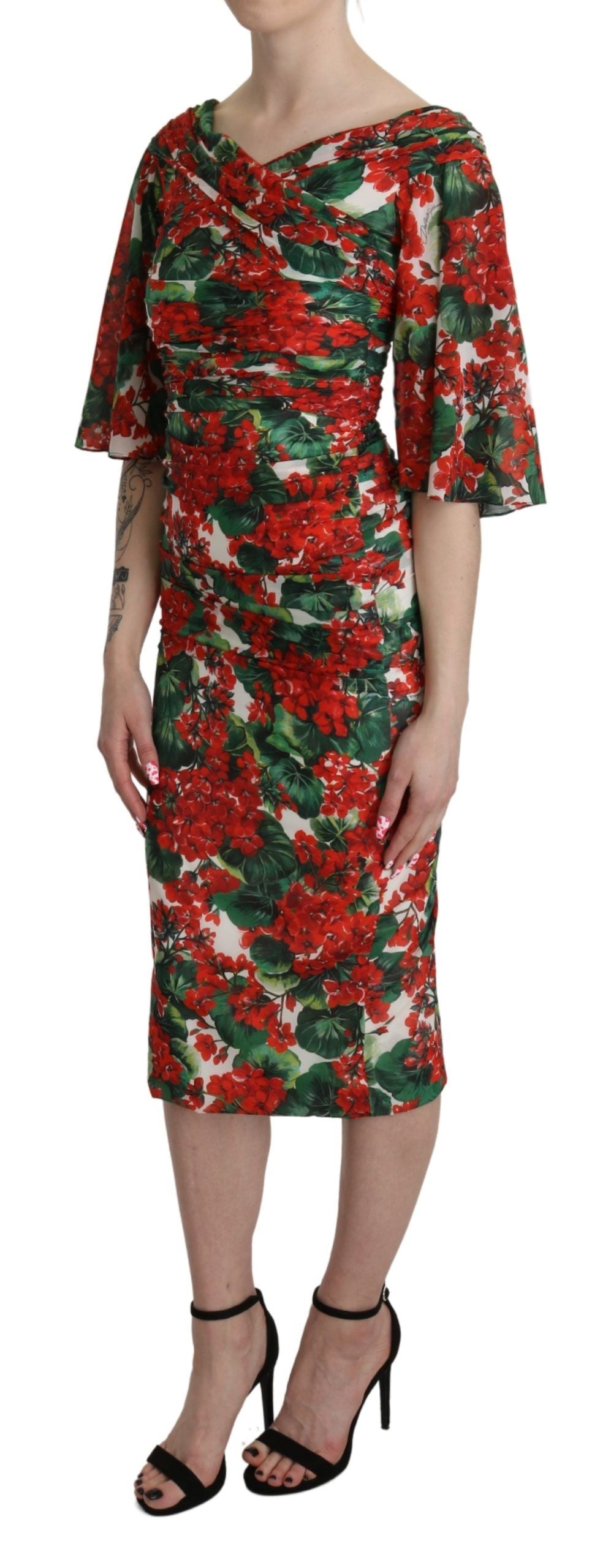 Red floral sheath midi silk stretch dress by Dolce & Gabbana, featuring a fitted silhouette with vibrant floral pattern.