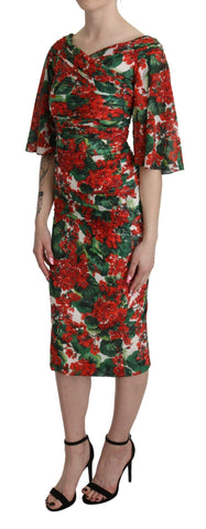 Red floral sheath midi silk stretch dress by Dolce & Gabbana, featuring a fitted silhouette with vibrant floral pattern.