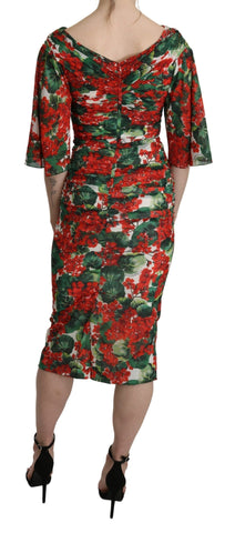 Red floral silk sheath midi dress by Dolce & Gabbana, featuring a fitted silhouette and vibrant floral print.