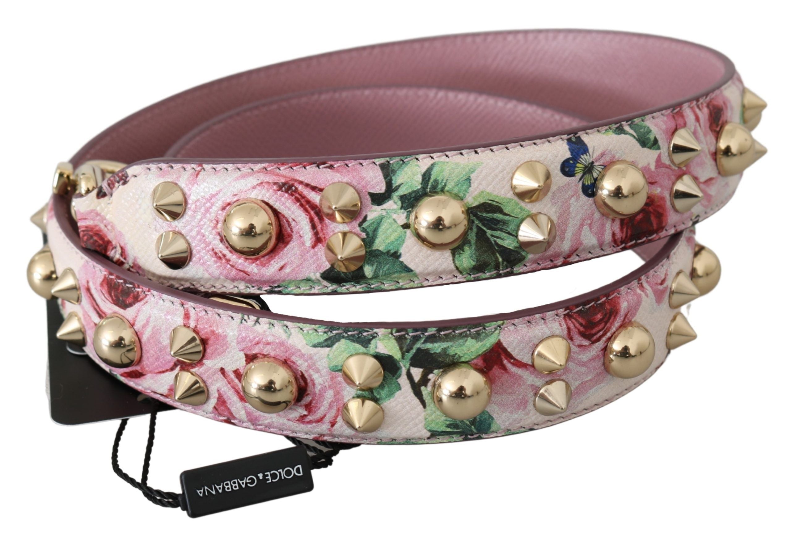 Pink floral leather shoulder strap with stud accents for accessories, by Dolce & Gabbana, featuring detailed floral and stud design.