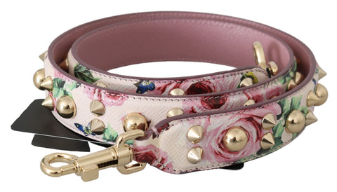 Pink floral leather shoulder strap with stud accents, designed by Dolce & Gabbana, featuring vibrant floral patterns and adjustable length.