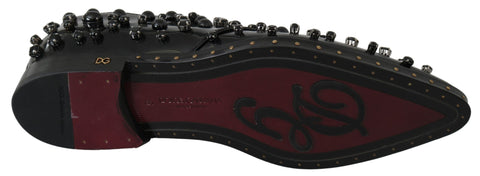 Black leather brogue shoes with crystal embellishments by Dolce & Gabbana, featuring classic lace-up design and detailed stitching.