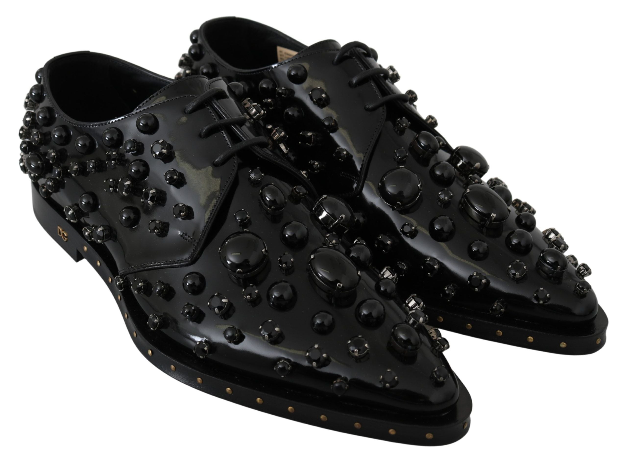 Black leather brogue shoes with crystal embellishments from Dolce & Gabbana, featuring a classic lace-up design and polished finish.