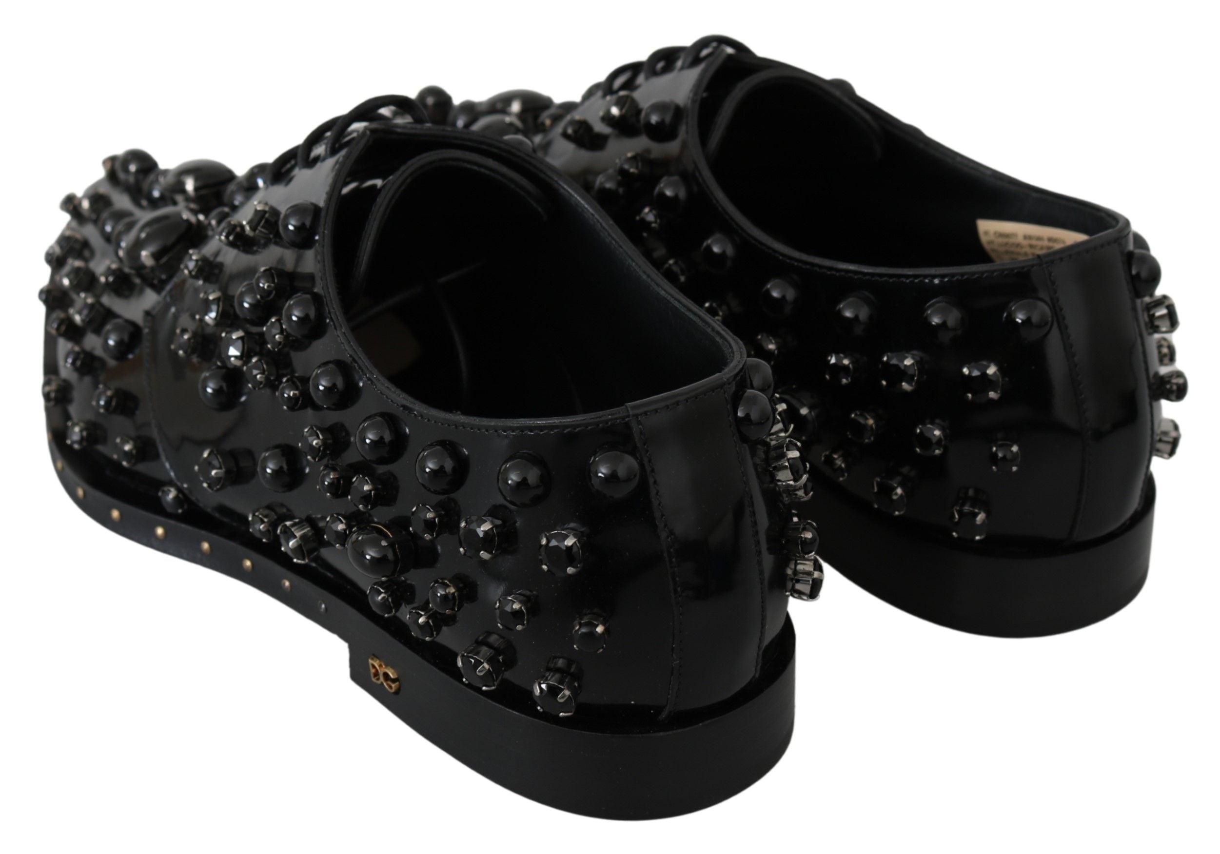 Dolce & Gabbana black leather brogue shoes with crystal embellishments, stylish dress shoes for formal occasions.
