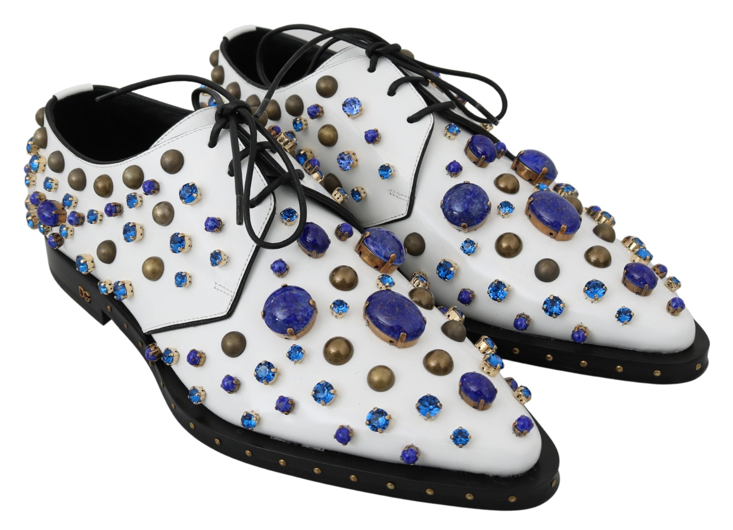 White leather brogue shoes with crystal embellishments by Dolce & Gabbana, featuring detailed stitching and classic design.