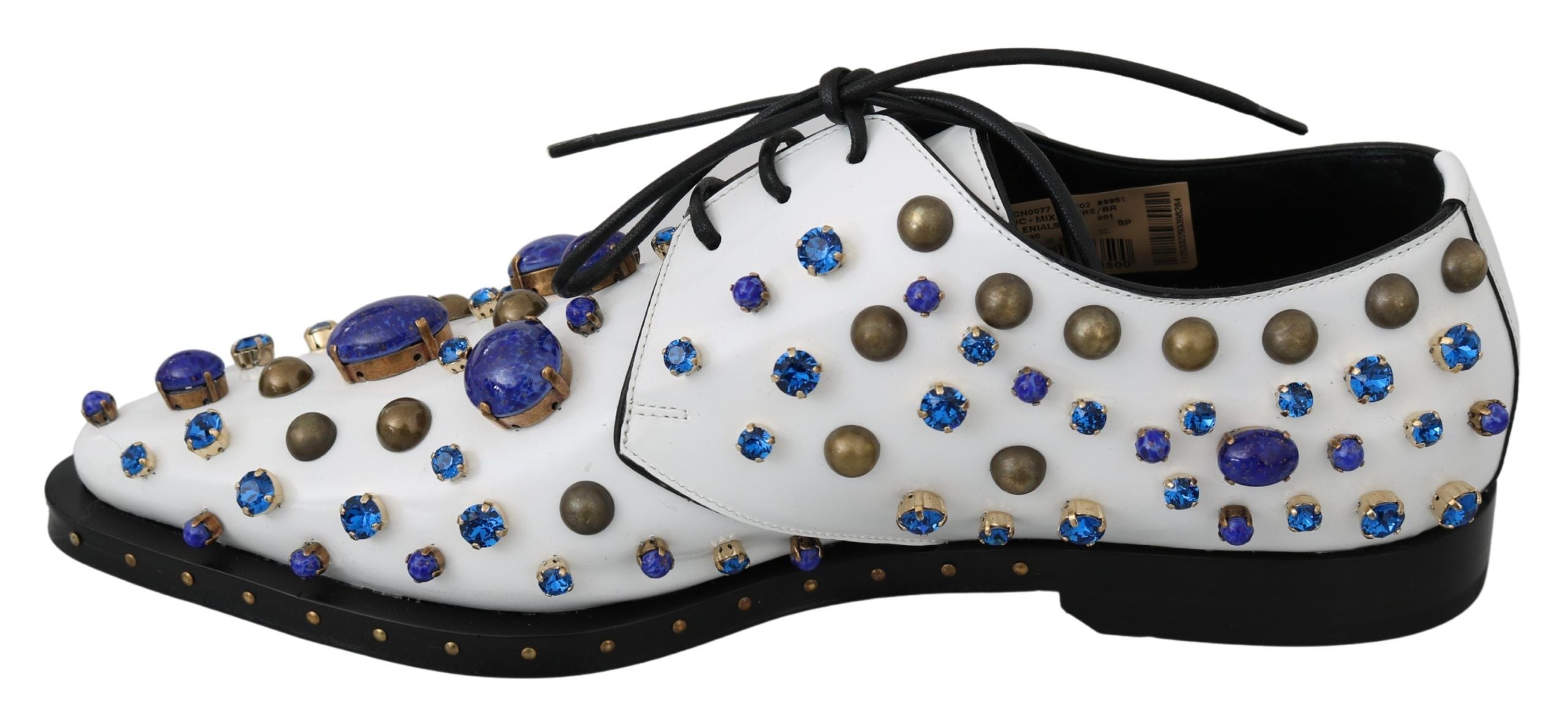 White leather brogue shoes with crystal embellishments by Dolce & Gabbana, featuring detailed stitching and classic design.