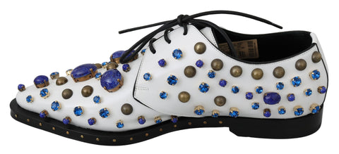 White leather brogue shoes with crystal embellishments by Dolce & Gabbana, featuring detailed stitching and classic design.