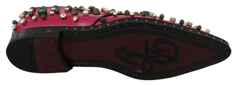 Pink leather brogue shoes with crystal embellishments by Dolce & Gabbana, featuring classic design and detailed craftsmanship.