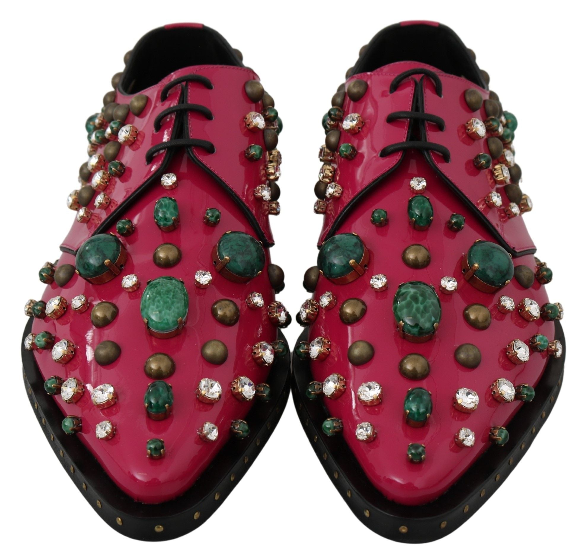 Pink leather brogue shoes with crystal embellishments by Dolce & Gabbana, featuring detailed stitching and classic design.