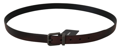 Solid brown leather belt with gray buckle from Dolce & Gabbana, showing the sleek strap and stylish buckle detail.