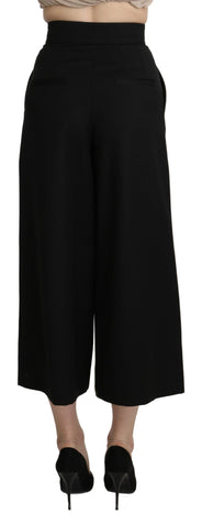 Black wide wool cropped trouser pant by Dolce & Gabbana with a tailored fit and cropped ankle length.