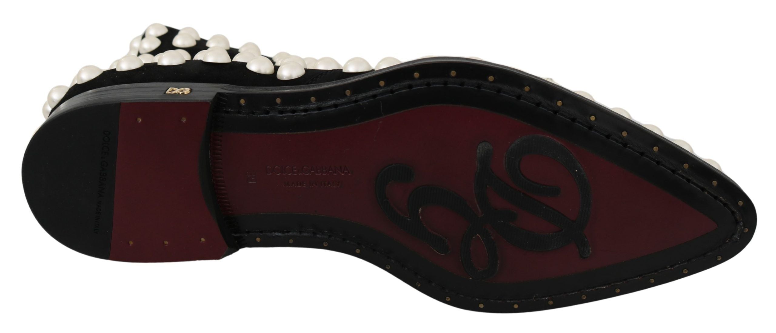 Black suede pearl studded boots by Dolce & Gabbana, featuring a stylish ankle-high design with decorative pearl accents.