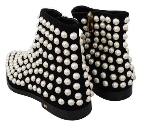 Black suede pearl studded boots by Dolce & Gabbana, stylish ankle shoes with decorative pearl embellishments.