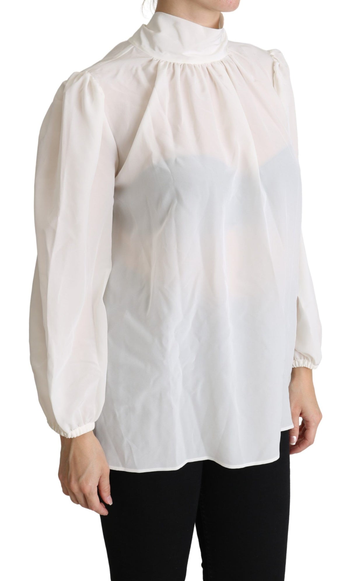 White silk pussy bow long-sleeved blouse by Dolce & Gabbana with a classic collar and elegant design.