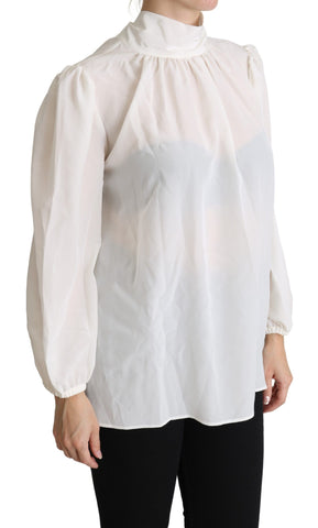 White silk pussy bow long-sleeved blouse by Dolce & Gabbana with a classic collar and elegant design.