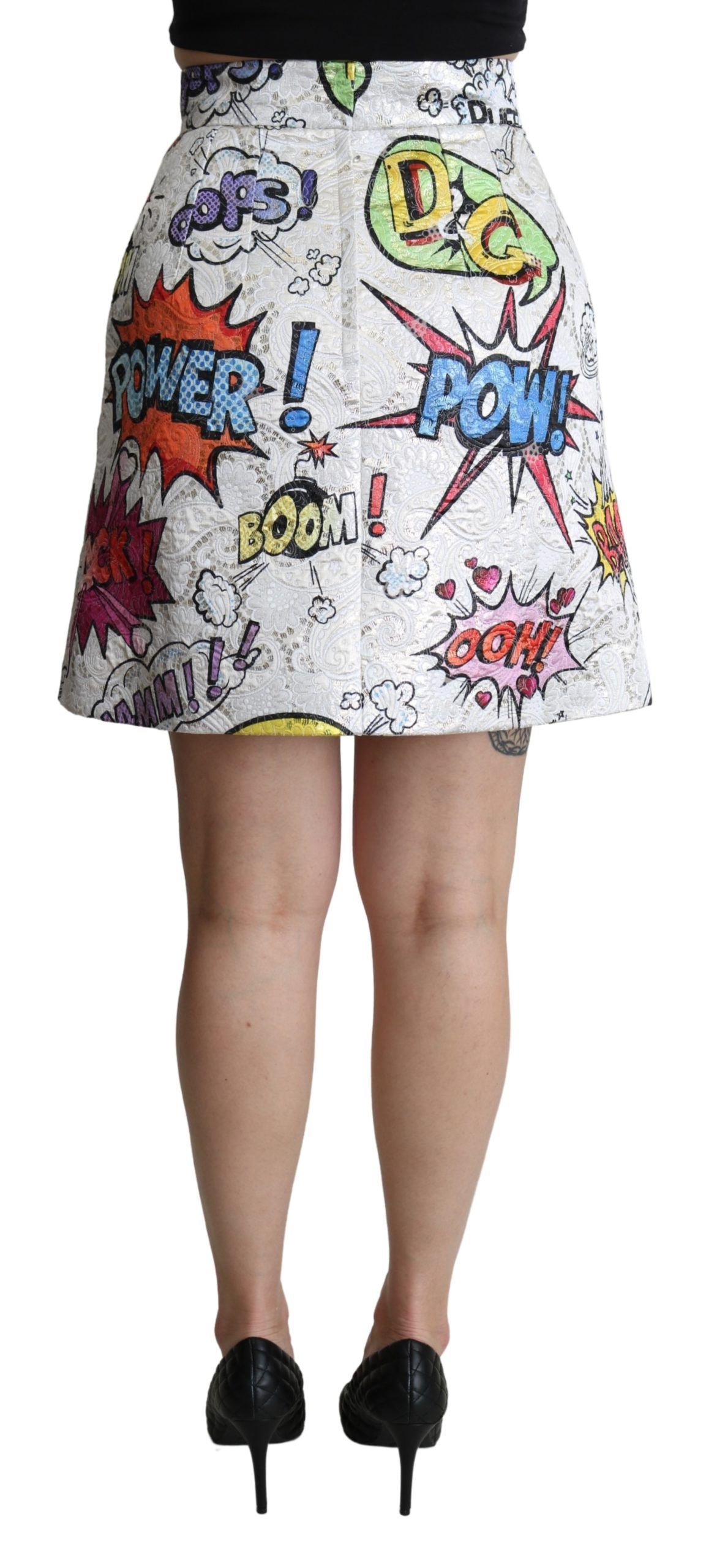 White cartoon brocade A-line high waist skirt by Dolce & Gabbana, featuring intricate pattern and elegant design.