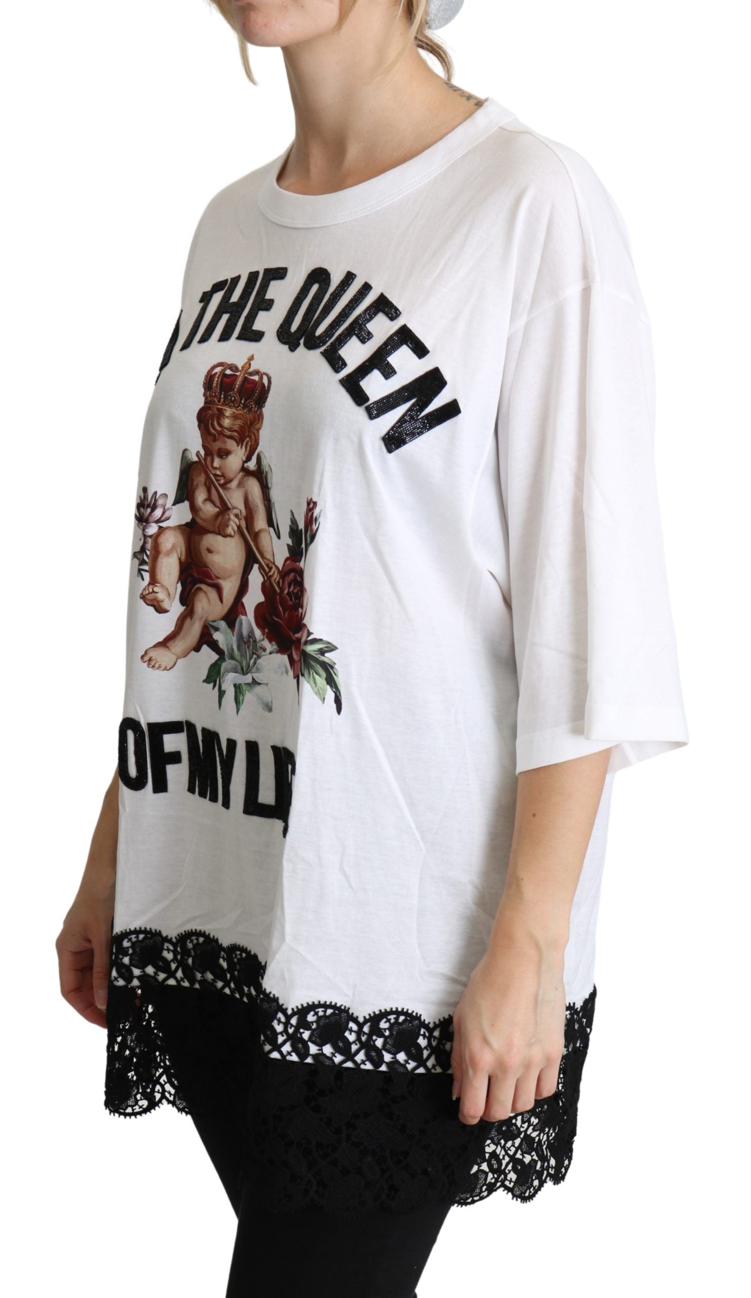 White cotton round neck shirt top with angel print by Dolce & Gabbana, shown on a hanger.