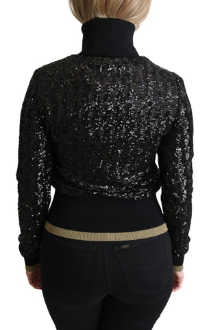 Black sequined knitted turtle neck sweater by Dolce & Gabbana, featuring a close-up of the sparkling, textured fabric.