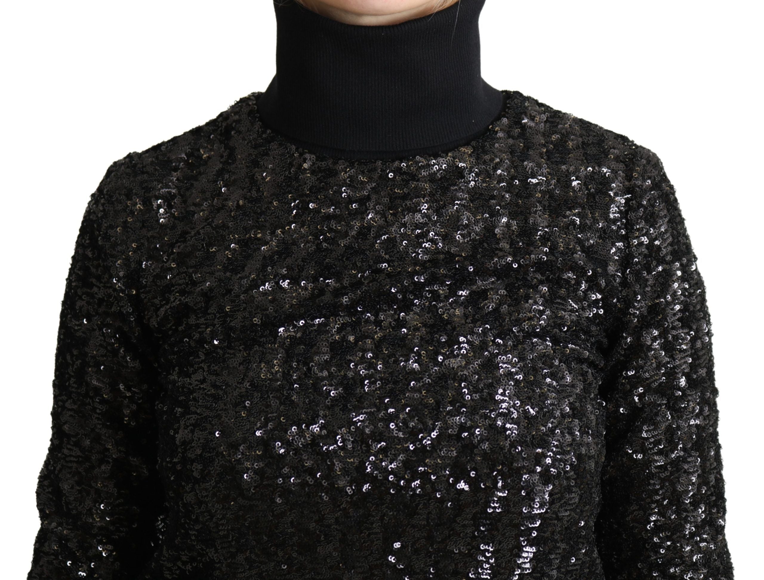 Black sequined knitted turtle neck sweater by Dolce & Gabbana featuring shimmering sequins and a cozy knit texture.