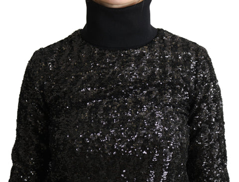 Black sequined knitted turtle neck sweater by Dolce & Gabbana featuring shimmering sequins and a cozy knit texture.