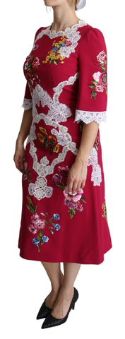 Red floral embroidered sheath midi dress by Dolce & Gabbana, featuring intricate embroidery and a sleek, fitted silhouette.