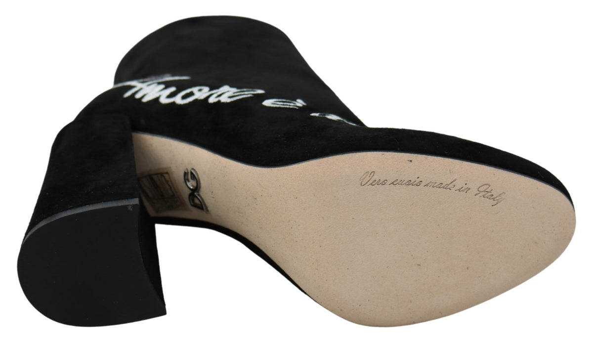 Black suede L'Amore E'Bellezza boots by Dolce & Gabbana, featuring a sleek design and stylish ankle height.