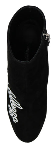 Black suede L'Amore E'Bellezza boots by Dolce & Gabbana with sleek design and pointed toes, displayed on a neutral background.
