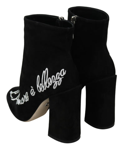 Black suede L'Amore E'Bellezza boots by Dolce & Gabbana, showcasing sleek design and elegant ankle-high style.