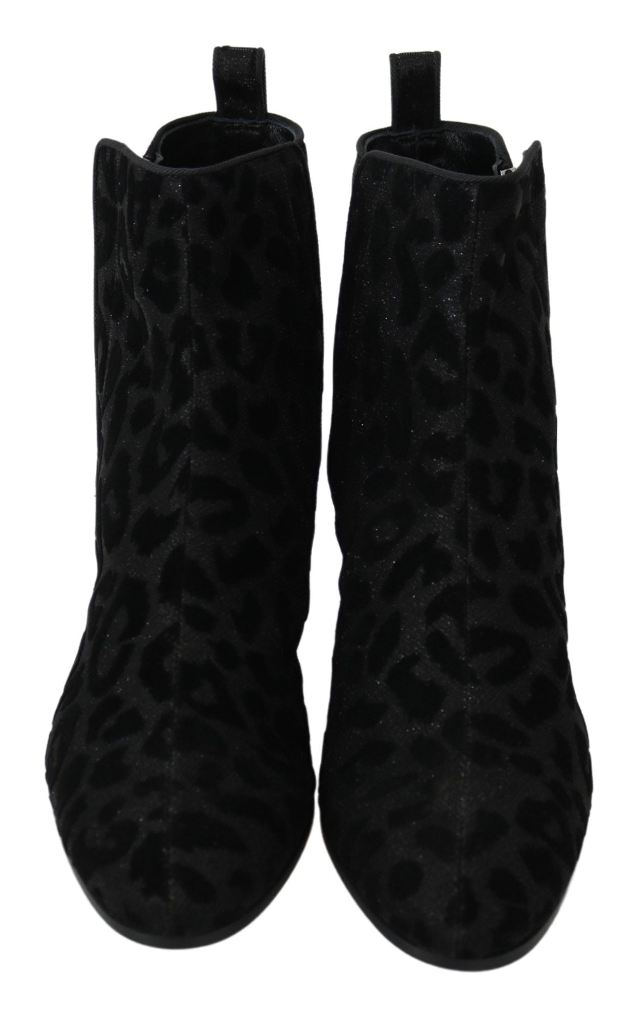 Black leopard print Dolce & Gabbana short boots with zipper detail, showcasing stylish footwear with bold animal print design.