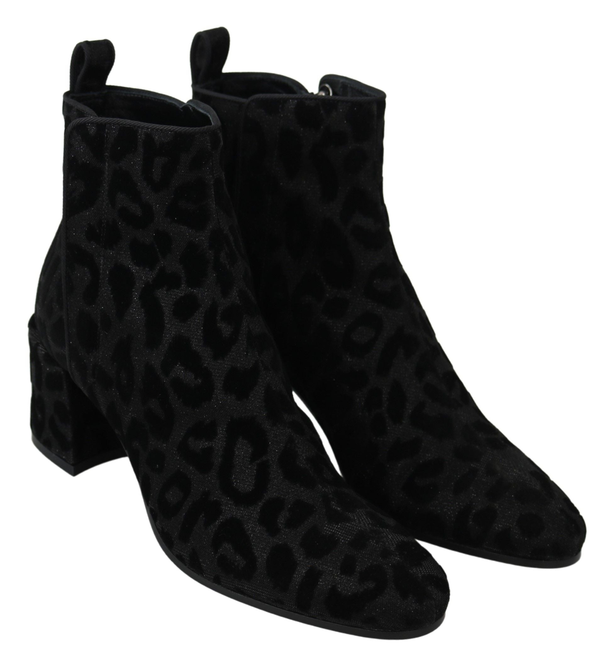 Black leopard print Dolce & Gabbana short boots with zipper closure, stylish and trendy footwear.