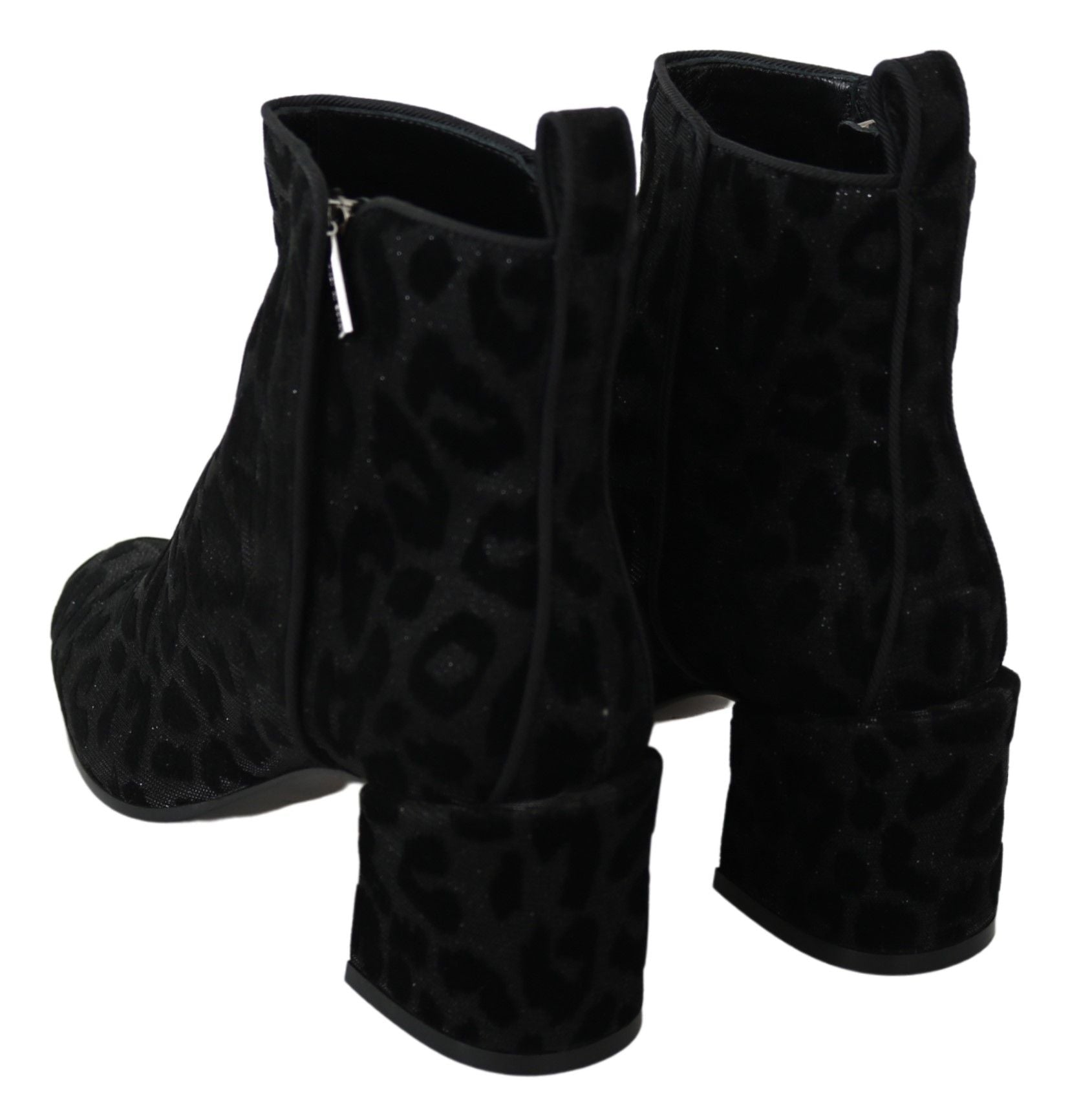 Black leopard print short boots with zipper detail from Dolce & Gabbana, showcasing stylish footwear with bold animal print design.
