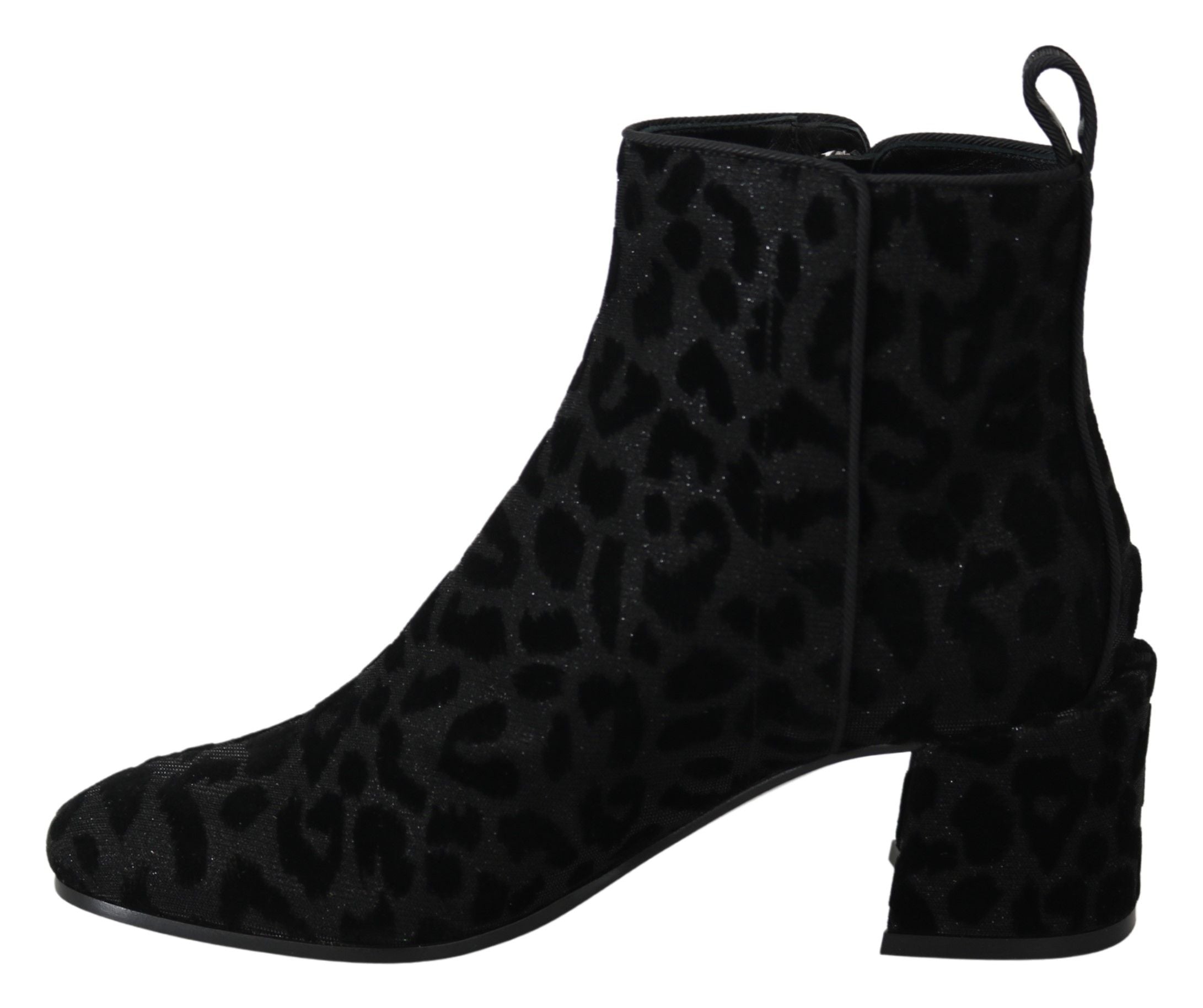 Black leopard print Dolce & Gabbana short zipper boots with pointed toes and chunky heels, stylish and bold footwear.