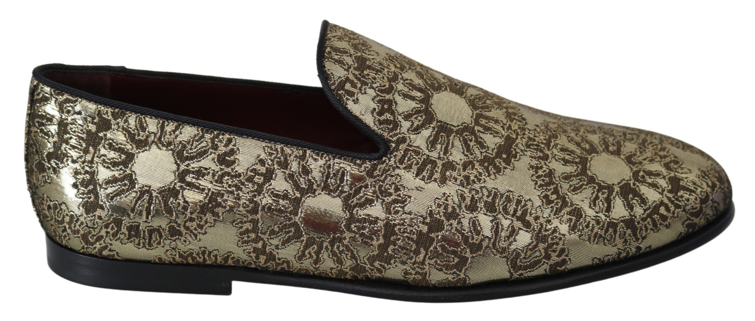 Gold Jacquard men's loafers by Dolce & Gabbana featuring intricate woven fabric and classic slip-on style.